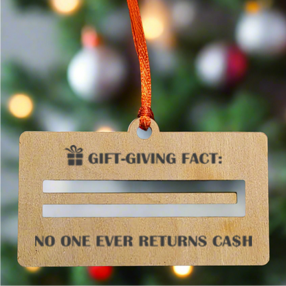 Gift tag with 'Gift-Giving Fact' text against a Christmas tree background